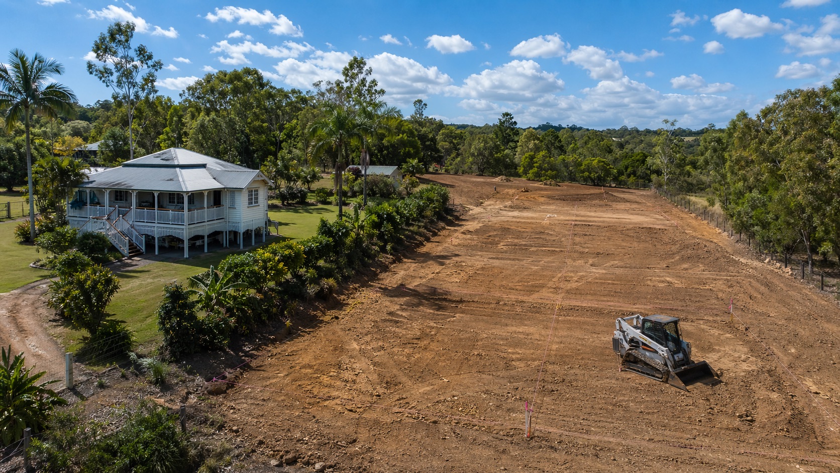 Queensland acreage property being subdivided with bobcat clearing land